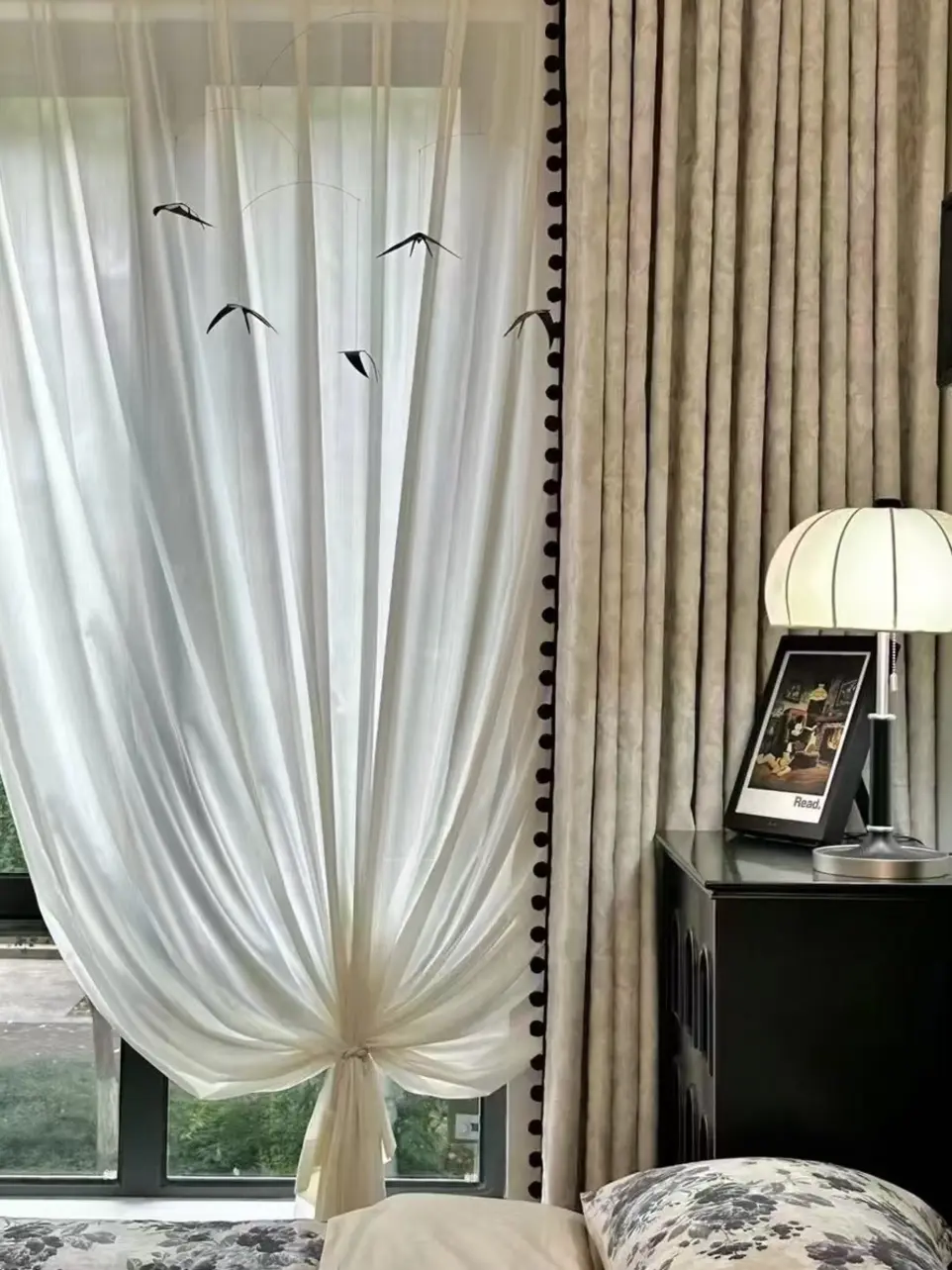 Sheer Linen Curtains in a Minimalist living room flooding the space with soft, natural light.