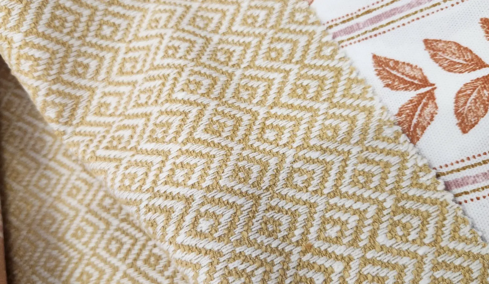 Luxury geometric patterned fabric – intricate design for upholstery, pillows, or rugs in high-end interior design.